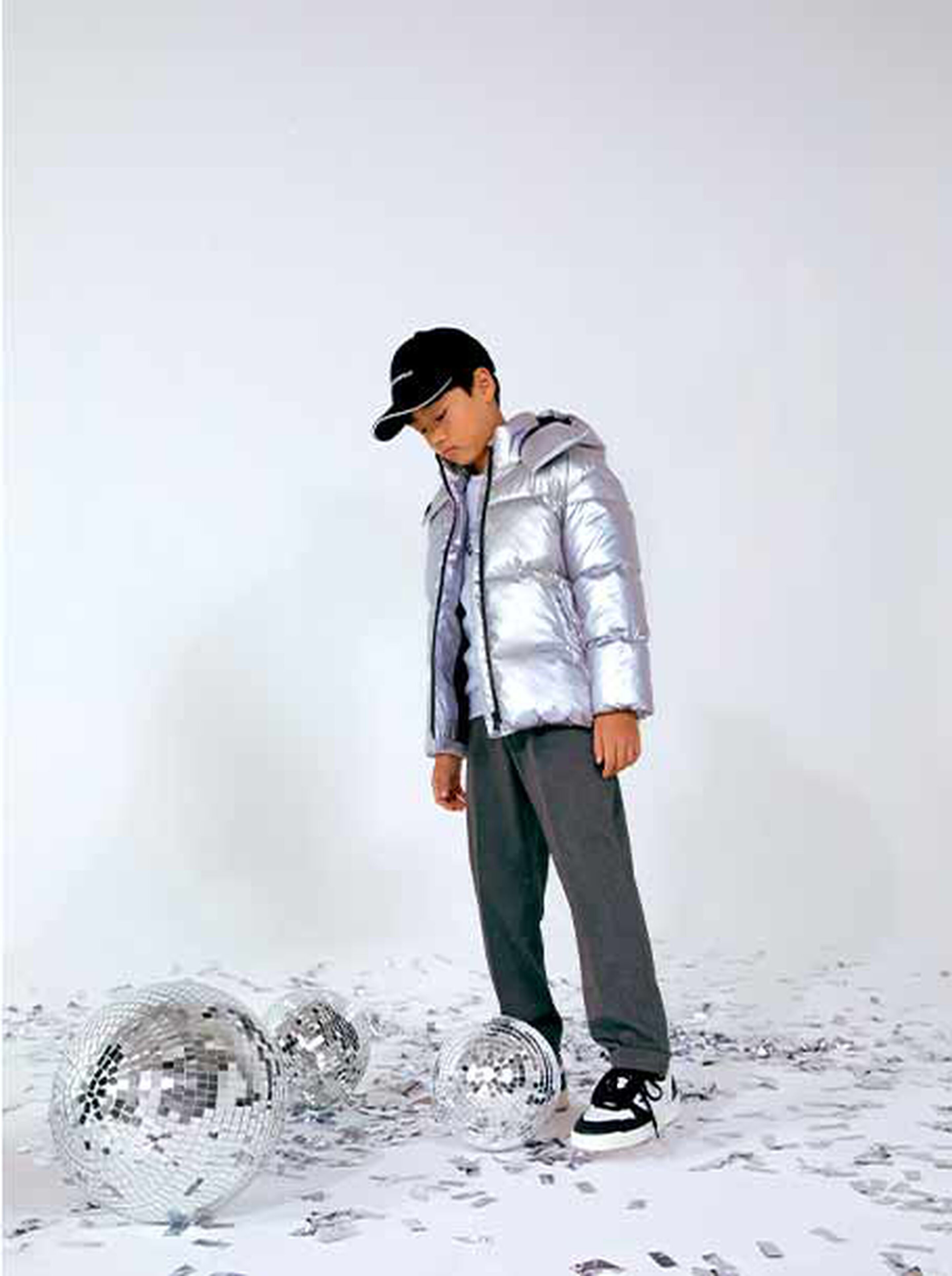 Boy dressed in an elegant suit with a bow tie for the holidays