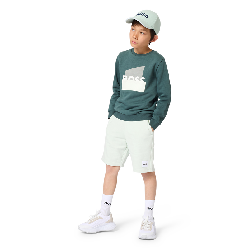 CAP WITH ADJUSTABLE CLOSURE BOSS 
                        BOY