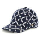 Satin-look patterned cap MICHAEL KORS 
                    GIRL