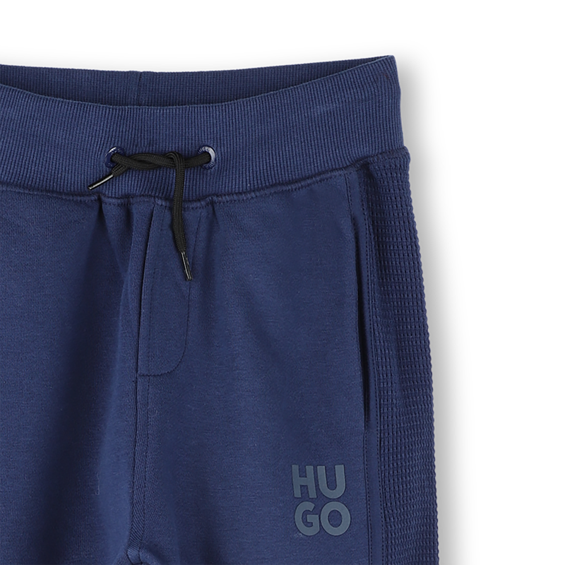 Jogging bottoms with pockets HUGO 
                        BOY